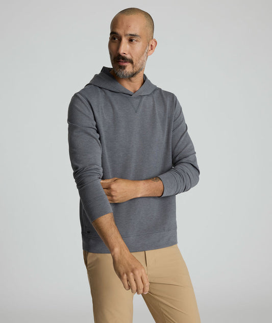Model is wearing UNTUCKit weatherby performance hoodie.