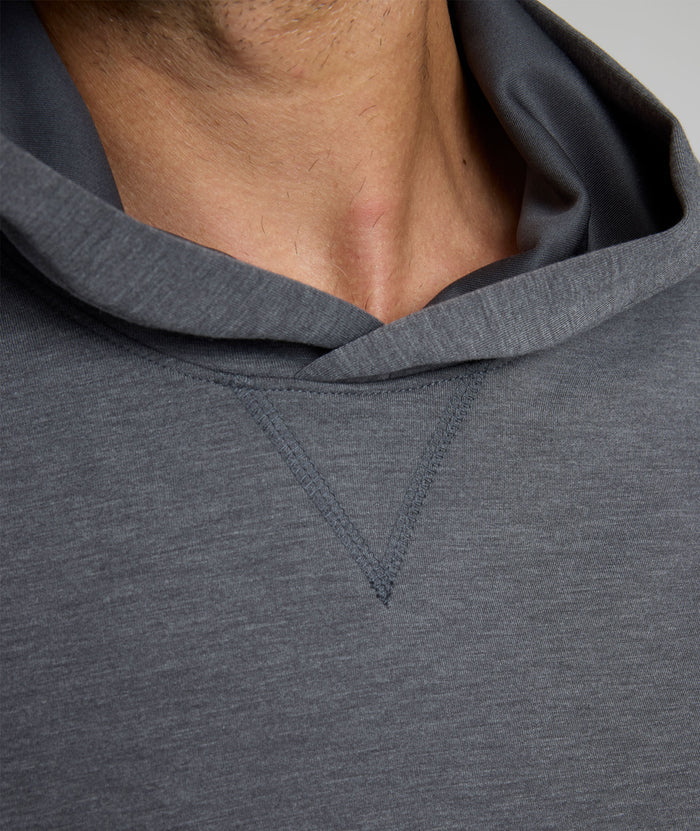 Model is wearing UNTUCKit weatherby performance hoodie.
