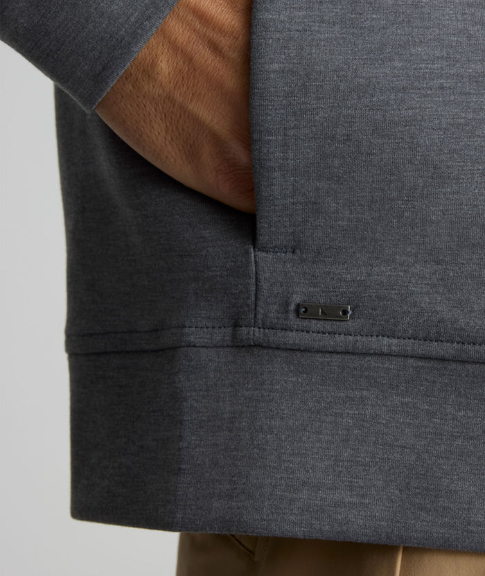 Model is wearing UNTUCKit weatherby performance hoodie.