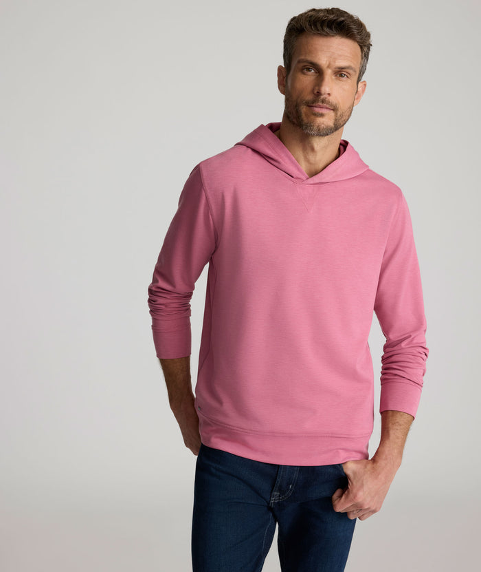 Model is wearing UNTUCKit Weatherby Performance Hoodie in Rose Wine.