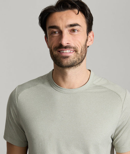 Model is wearing UNTUCKit Clarendon performance tee in shadow.