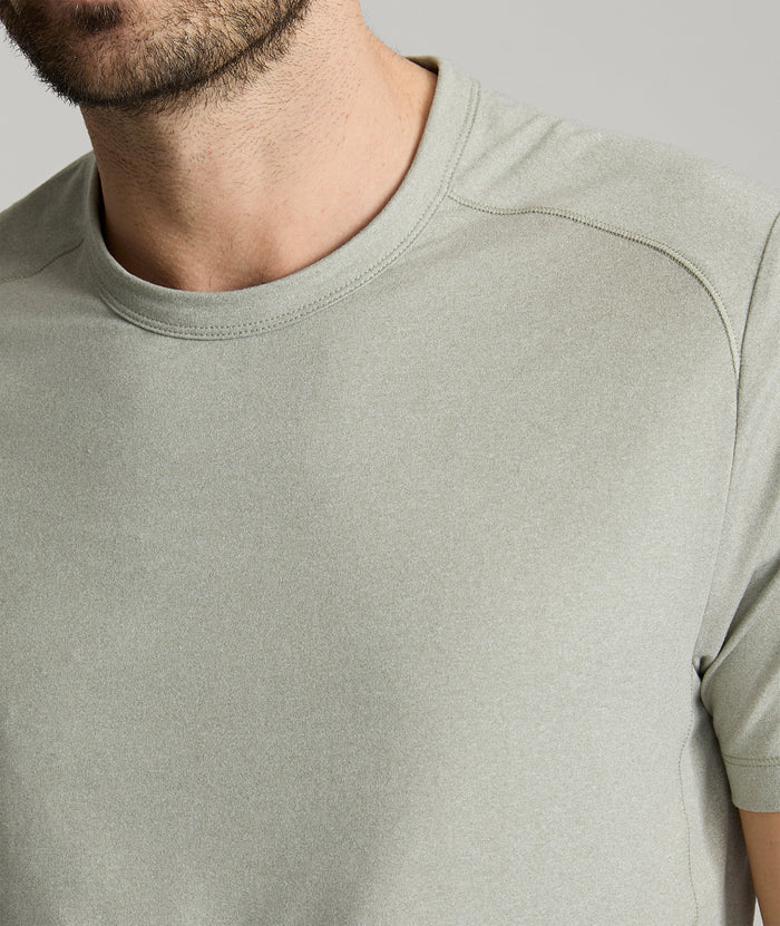 Model is wearing UNTUCKit Clarendon performance tee in shadow.