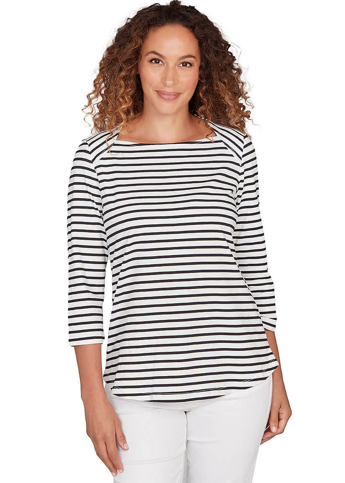 Woman wearing a black and white striped shirt on a white background