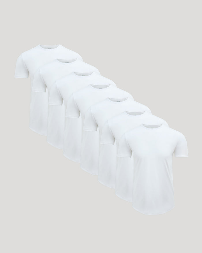 True Classic Men’s Pima Cotton Blend Curved Hem Crew T-shirts arranged stylishly.