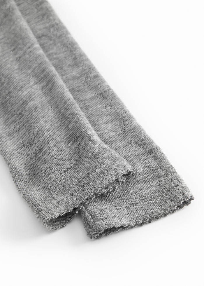 Gråmelerede uld leggings med let rynket kant ved benåbning.