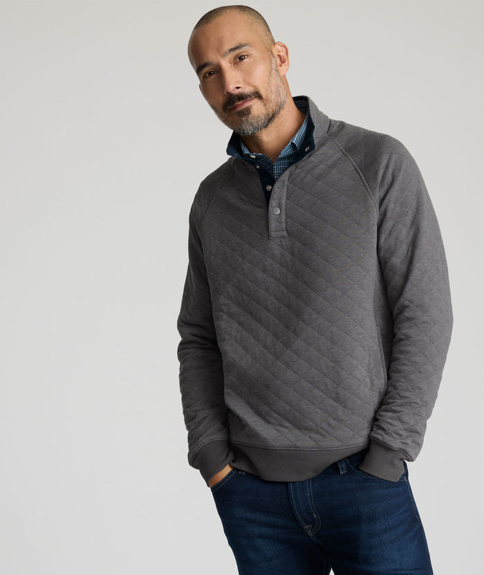 Model is wearing UNTUCKit Garrison pullover in forged iron.