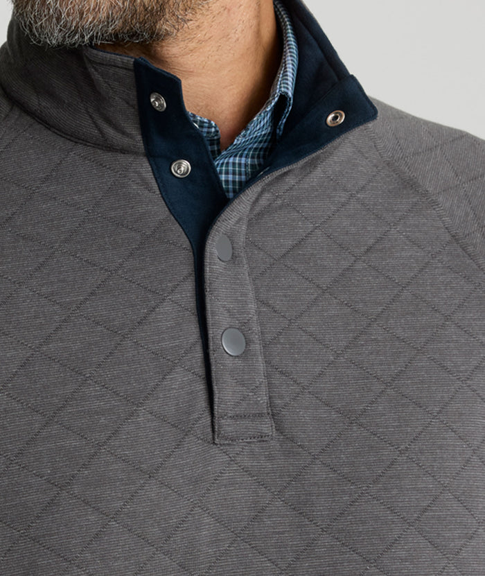 Model is wearing UNTUCKit Garrison pullover in forged iron.