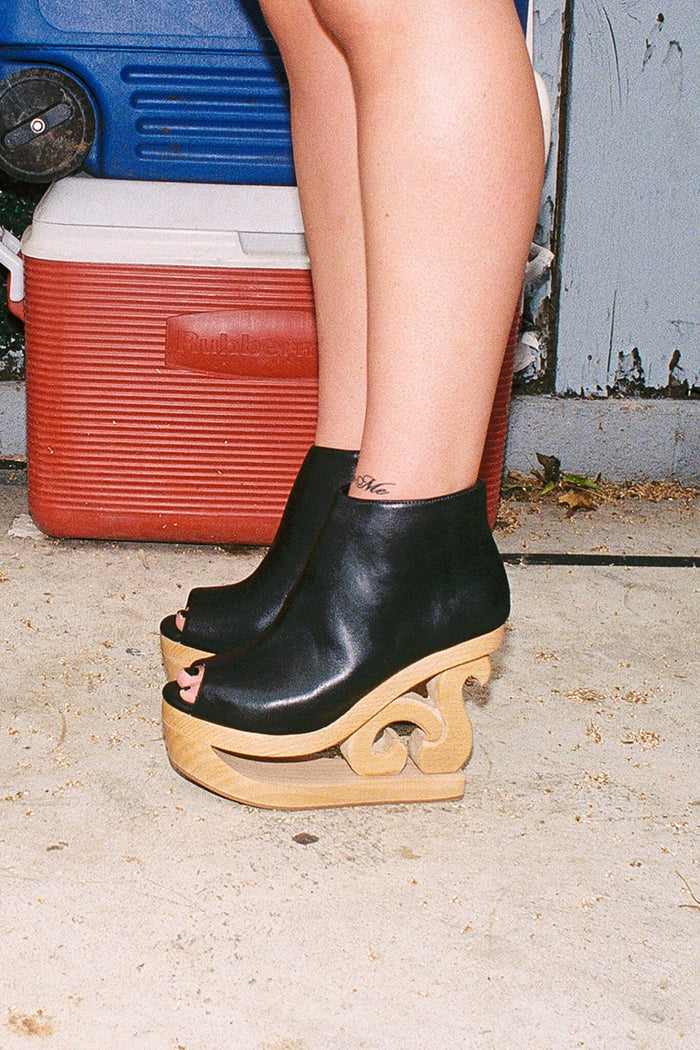 SKATE Jeffrey Campbell Wooden Wedge Platforms Black
_hover