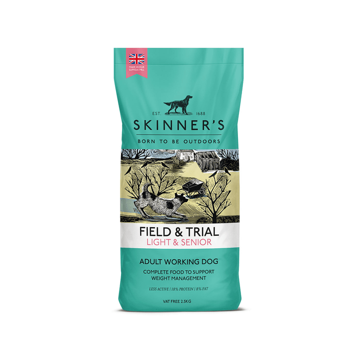 A bag of Skinner's Field & Trial Light & Senior dog food for adult working dogs, featuring a teal bag with a central illustration of a field, trees, and dogs.