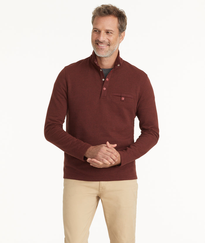 Model is wearing UNTUCKit Snap Fleece Pullover in Brick Red.