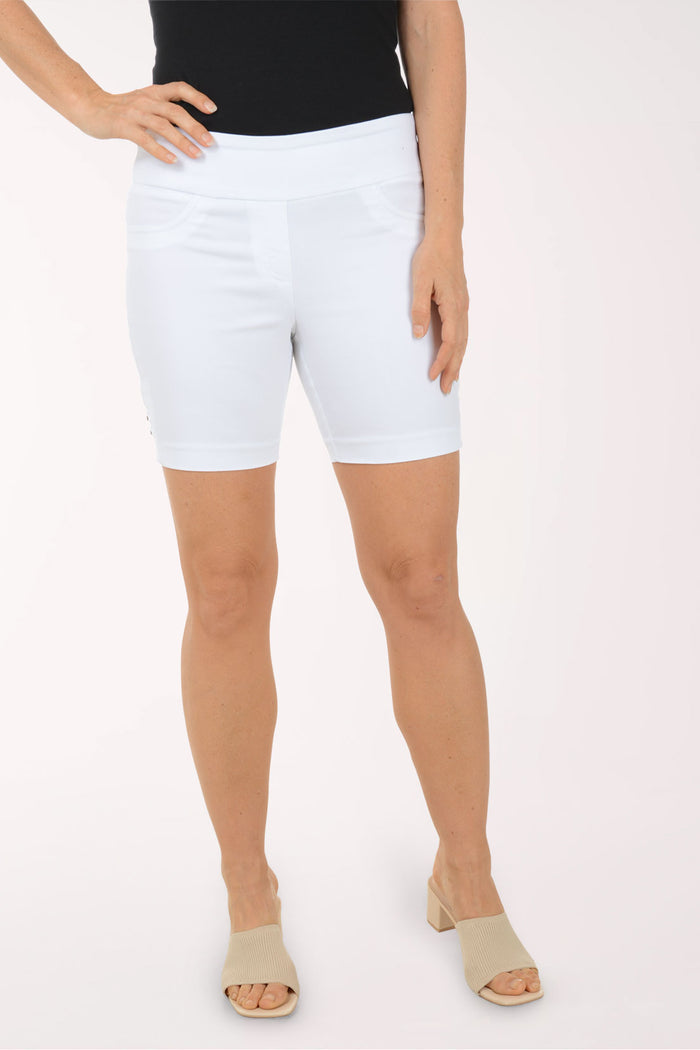 Person wearing white shorts on a white background