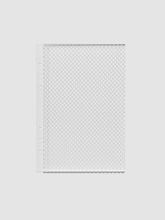 Clear, textured Studded Planner Dashboard in the size A5, on a neutral background.