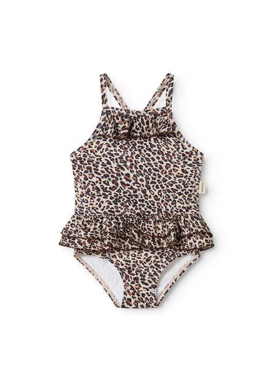 Brown leopard-patterned swimsuit with crossed straps and ruffle skirt