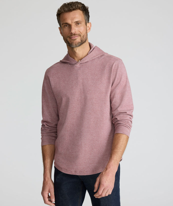 Model is wearing UNTUCKit Textured Knit Hoodie in red.