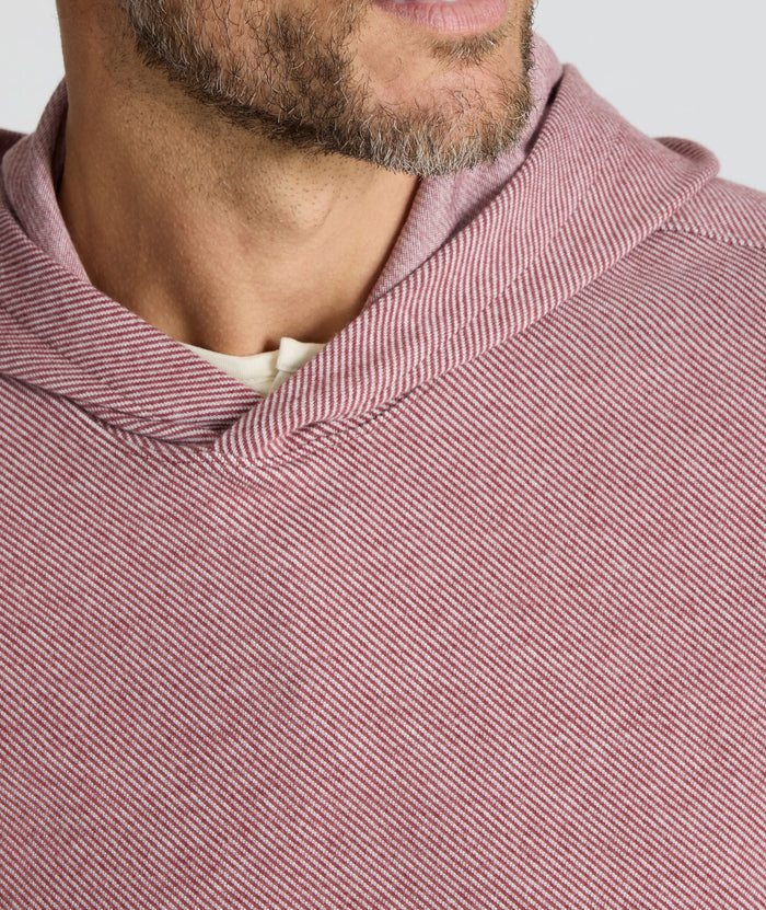 Model is wearing UNTUCKit Textured Knit Hoodie in red.