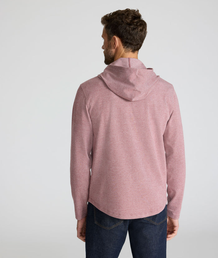 Model is wearing UNTUCKit Textured Knit Hoodie in red.