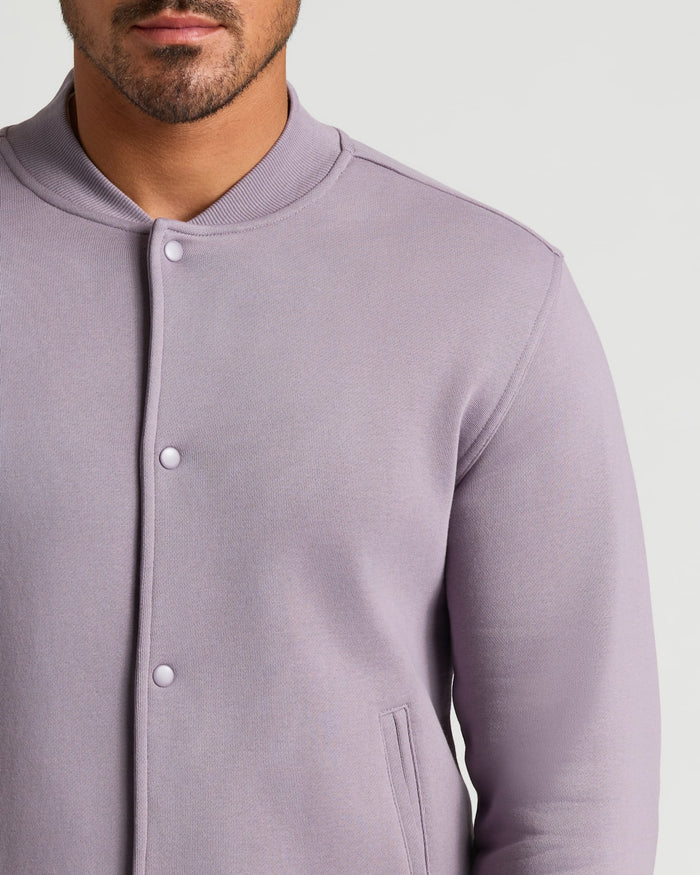 Thistle Fleece Bomber Jacket with ribbed collar and welt pockets.