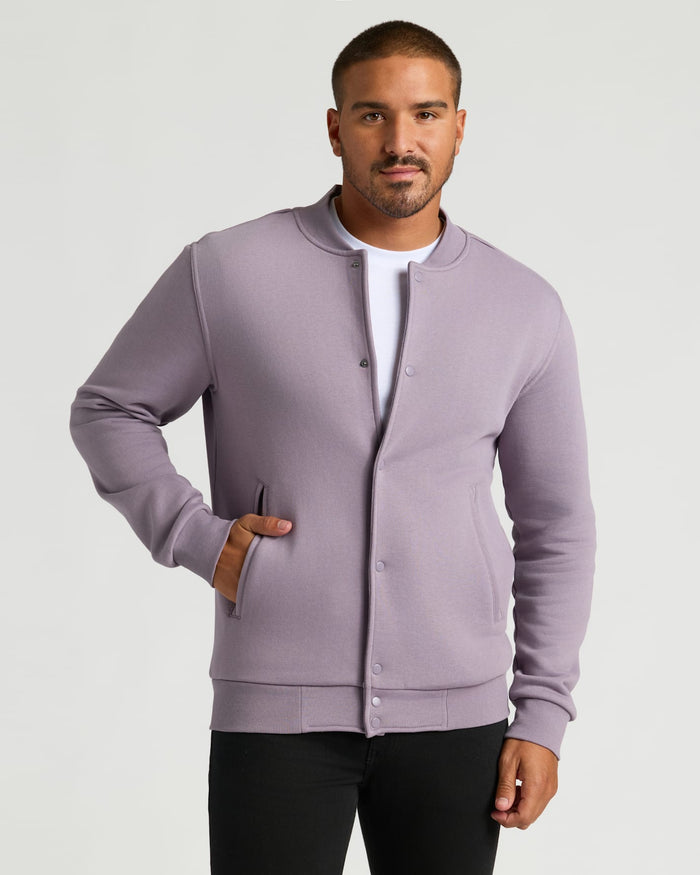 Model wearing Thistle Fleece Bomber Jacket, showcasing its classic bomber fit.