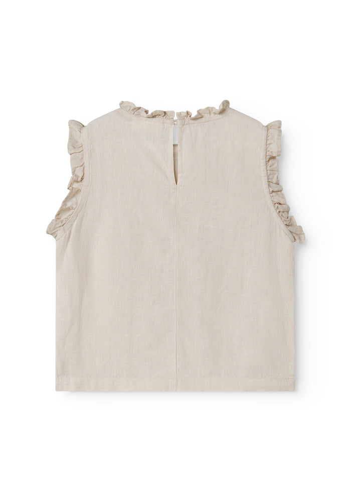 Sleeveless beige top for children with pleats.