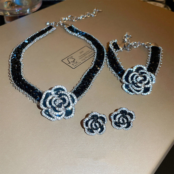 Trendsi alloy flower statement necklace set with matching bracelet and earrings in black and silver tones