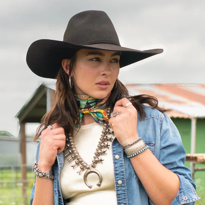Woman in cowboy hat wearing Geiman Fringe Scarf
