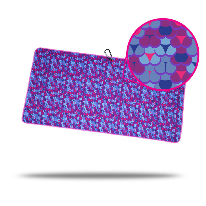 The Whale Tail - Towel features a vibrant blue and magenta geometric pattern with 2-sided print. A close-up shows overlapping scallop shapes in magenta, blue, purple, and turquoise tones. The towel appears to float with a soft shadow below.