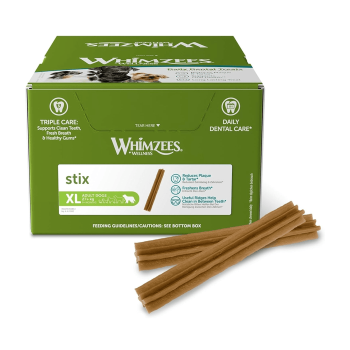 White background with a green and white box of 30 Whimzeez Dental Stix Treats with a several large dogs pictured on the box with two of the chews in front of the box.