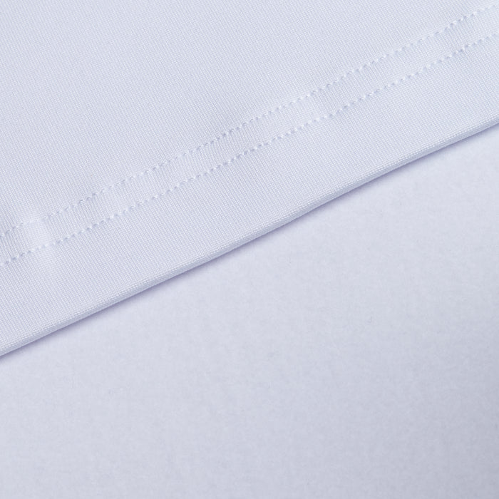 Close-up of White - Q-Zip’s moisture-wicking fabric with a visible diagonal seam. The smooth, slightly textured material and precise stitching highlight the technical details and athletic fit of this performance piece.