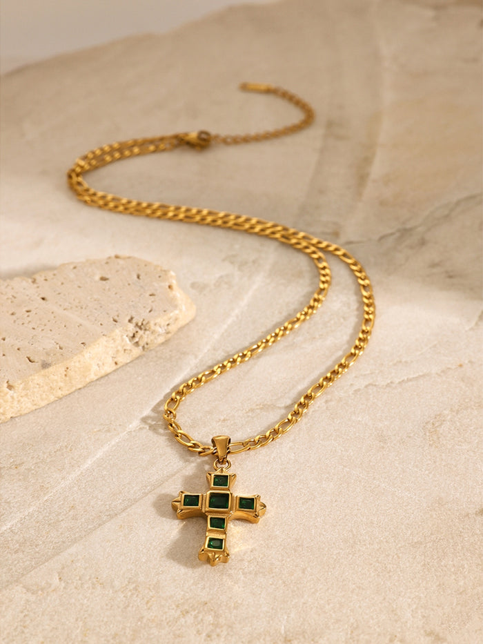 Gold chain necklace with a zircon cross pendant for women featuring green stones and elegant design